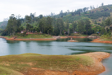 Fototapeta premium view to lake or river from land hills on Sri Lanka