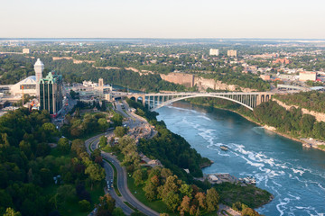 Fototapeta na wymiar Niagara Falls City and Rainbow Bridge