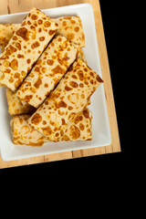 Russian Stuffed Pancakes Isolated on Black. Selective focus.