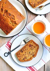 Vegan banana cake with raisins, dried cranberries and nuts.