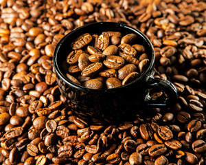 Roasted coffee in cup.