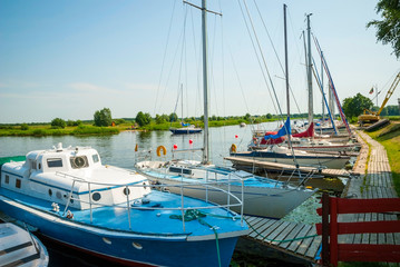 Sailing boats on the river in Silute, Lithuania
