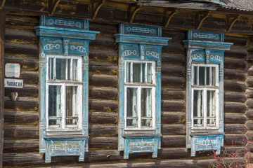 Fototapeta na wymiar Carved window in old russian wooden country house