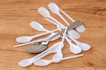Metal and plastic spoon