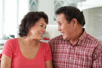 Fototapeta premium Head And Shoulders Shot Of Senior Hispanic Couple At Home