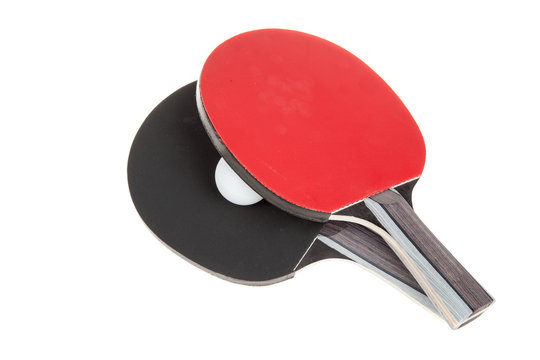 Pair of ping-pong rackets and white ball, isolated on white background