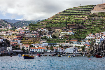 Madeira seafront, Portugal. Fishing village Camara de Lobos.