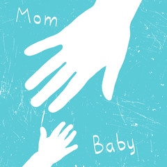 Mom's and baby's hands.
