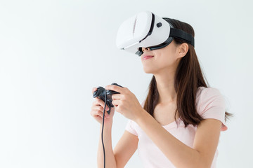 Woman play video game with joystick with VR device © leungchopan