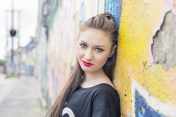 Urban portrait of beautiful young woman.