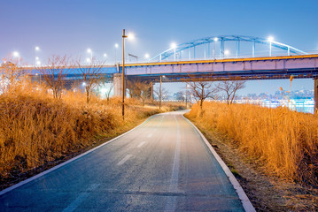 Romantic night scene of cycling path near the han river