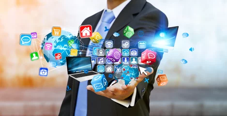 Foto op Plexiglas Businessman holding multimedia tech devices in his hand © sdecoret