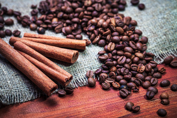 Coffee beans on wood background