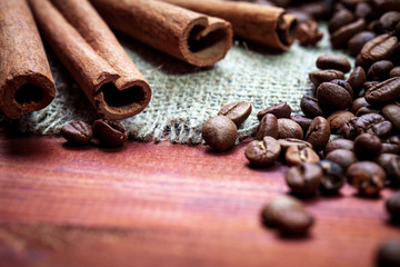 Coffee beans on wood background