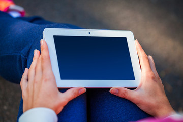 table pc in a hand for a girl