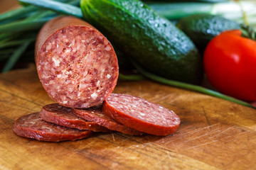 Sujuk sausage on cutting board