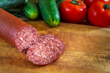 Sujuk sausage on cutting board