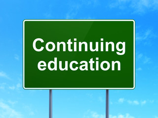 Studying concept: Continuing Education on road sign background