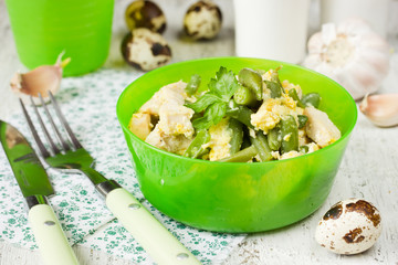 Salad with green beans with chicken fillet and fried egg