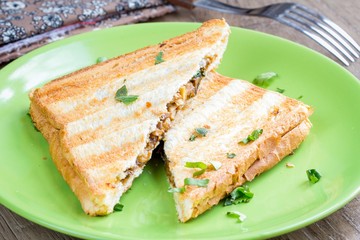 Mushroom cheese sandwich on grill, delicious snack, breakfast