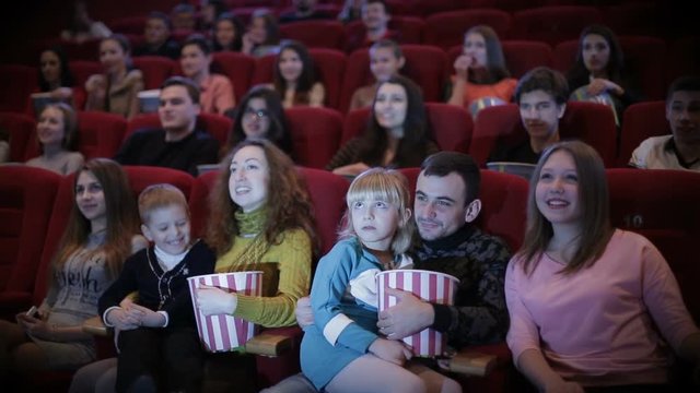people watching movie in cinema