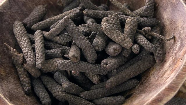Rotating Long Pepper as not loopable 4KUHD footage