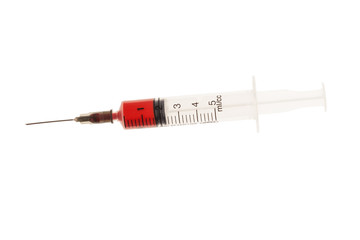 Syringe with blood isolated on white