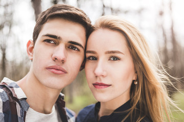 Close up portrait of attractive young  couple outdoors