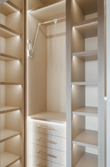 White empty wooden wardrobe in home interior