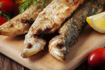 Russian fish smelt on the wooden table