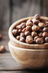 Raw healthy hazelnut on the wooden table