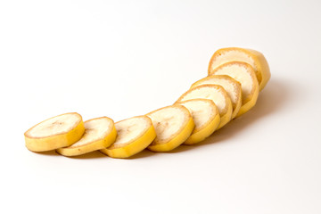 Banana slices with its peal isolated on a white background with shallow depth of field