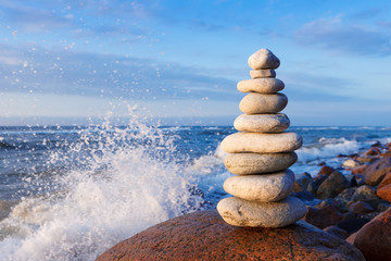 Concept of balance and harmony. Rock Zen at sunset.