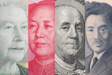 Currency War. Photo Shows Canadian, Chinese, US and Japanese Banknotes