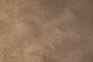 A brown leather texture closeup. Matte background