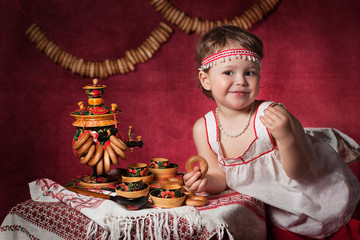 Little girl with samovar