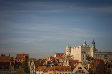 Ducal Castle, Szczecin (Poland) in the sunny day with residential buildings in old town