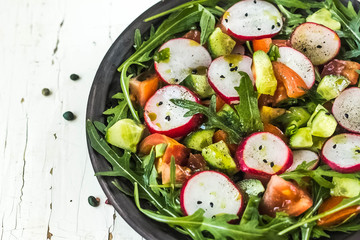 Vegetable salad on wooden background