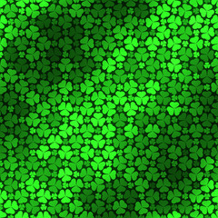 Seamless pattern with green clovers