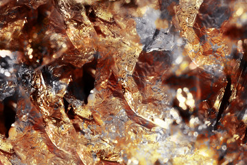 Shiny color gold foil, abstract texture background.
