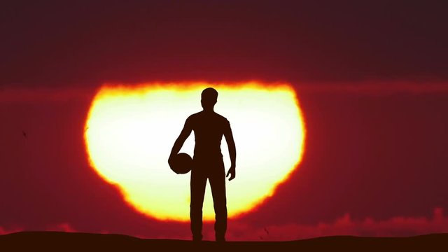 3 in 1! The man stand with a ball against the background of sunset. Time lapse