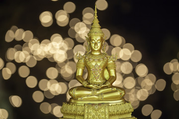 golden Buddha.Buddha on a bokeh background.