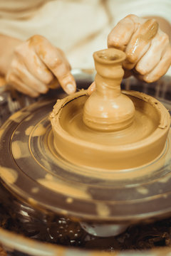 man working on a potter's wheel