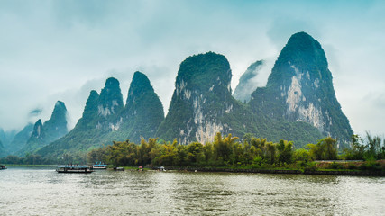 Low-lying Clouds and Limestone Outcrops by the Li River - Guilin, China