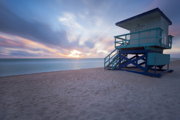 Sunrise in Miami Beach with a lifeguard post 