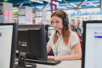 student working in computer class