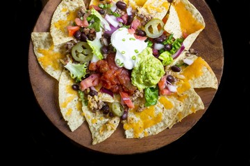 Nacho Cheese Tortilla chips with chili and salsa