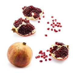 Set of pomegranate with grains on white background 