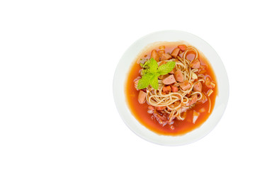 Spaghetti pasta with sausage on black background,clipping path.