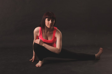 Fototapeta na wymiar Woman doing stretching exercises